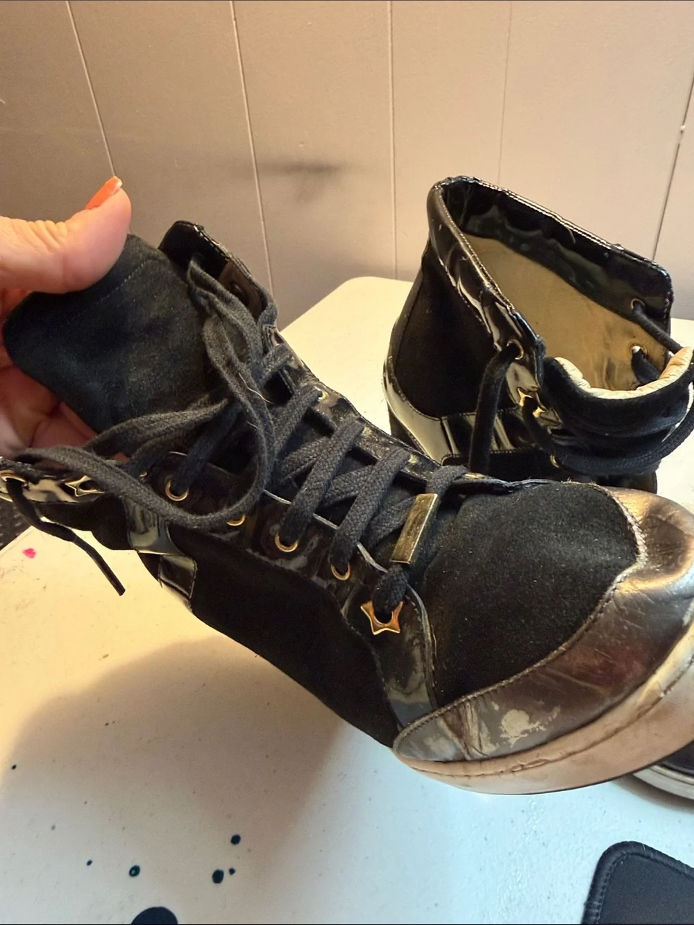 Jimmy Choo Black Wedge High-Top Sneakers with Gold Accents